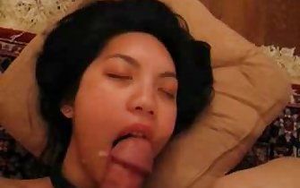 Asian babe deepthroating white cock from