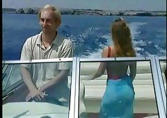 Mature topless women on boats