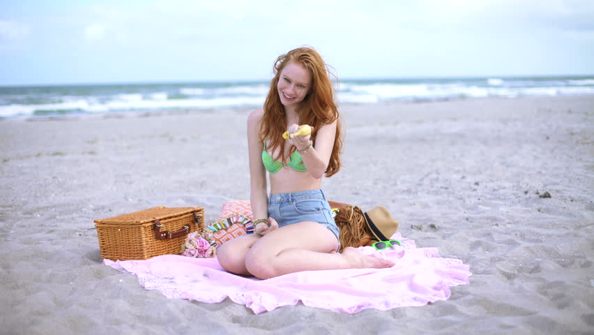 Beach girl redhead