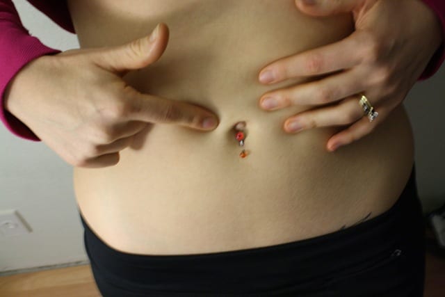 Flick belly button ring