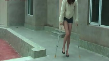 Chinese girl sprains ankle black nylon