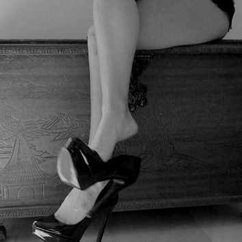 Black high heels dangle