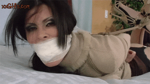 Bound chair gagged taped helpless