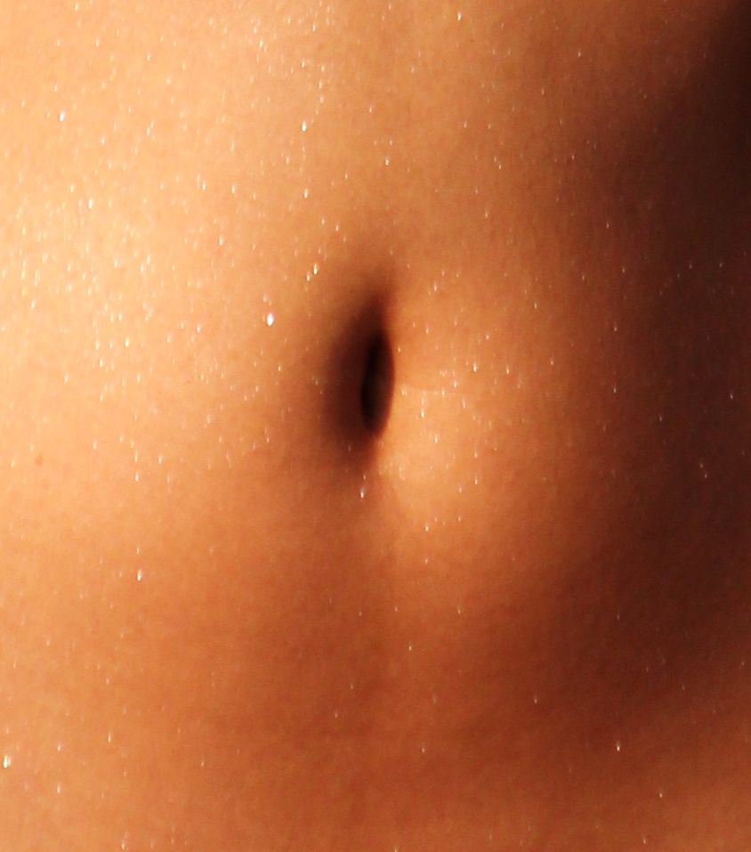 Flick belly button ring.